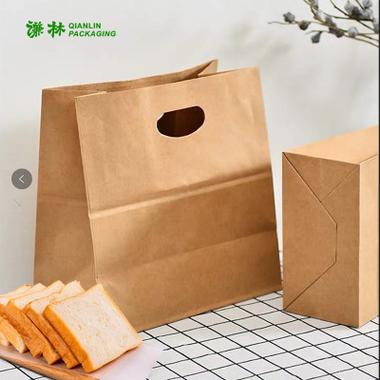 加厚冲孔牛皮纸手提袋 餐饮烘焙外卖打包的绿色首选